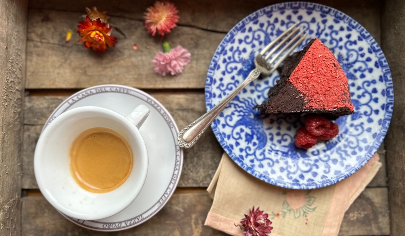 Slice of flourless chocolate cake with espresso